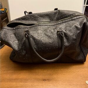 Spacious Black Duffel Bag with Textured Design
